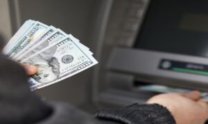 ATM money - Image via Shutterstock