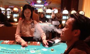 cigarette smoke in front of borgata atlantic city blackjack dealer