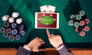 image of man playing online poker, which new jersey players can do to earn part of $1.4 million at the wsop online super circuit series