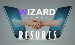 two hands shake through phones with logos from wizard games and resorts online casino new jersey