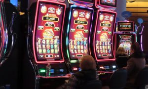 patrons play slots at ocean casino resort for a story on december 2023 revenue from atlantic city casinos