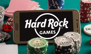 hard rock games logo on a phone for a story on hard rock's new free-to-play casino launching