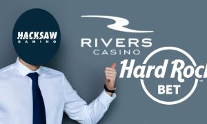 Businessman with Hacksaw Gaming logo points to BetRivers and Hard Rock for a story on two online casino partnerships