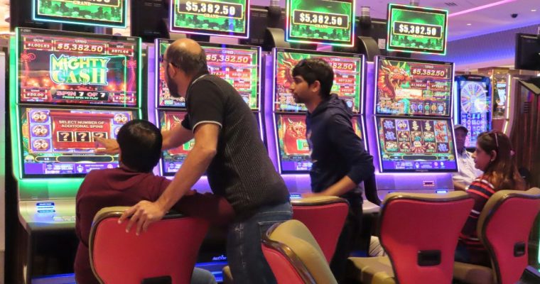 Image of gamblers play slots at Hard Rock Atlantic City for a story on the April 2024 revenue report for Atlantic City casinos.