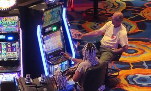 Gamblers play slots at Ocean Casino Resort for a story on May 2024 revenue from Atlantic City casinos.