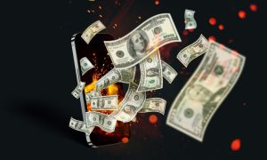 Image of a phone with dollar bills flying out for a story on the June 2024 revenue report for online casinos in New Jersey.