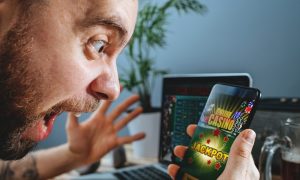 man wins online casino jackpot on his phone