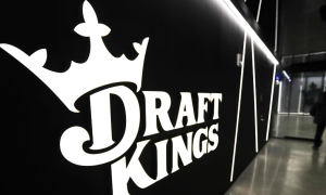 A wall with the DraftKings logo over it