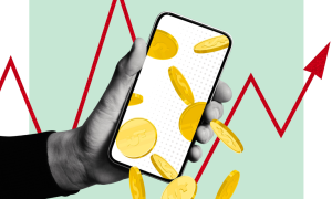 A phone with coins falling out of it