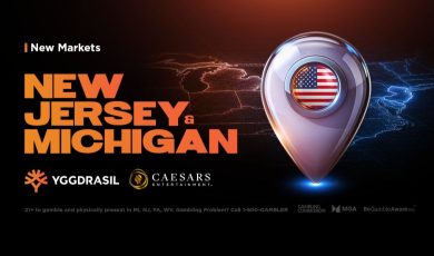 Yggdrasil and Caesars Entertainment logos over a New Jersey and Michigan map graphic